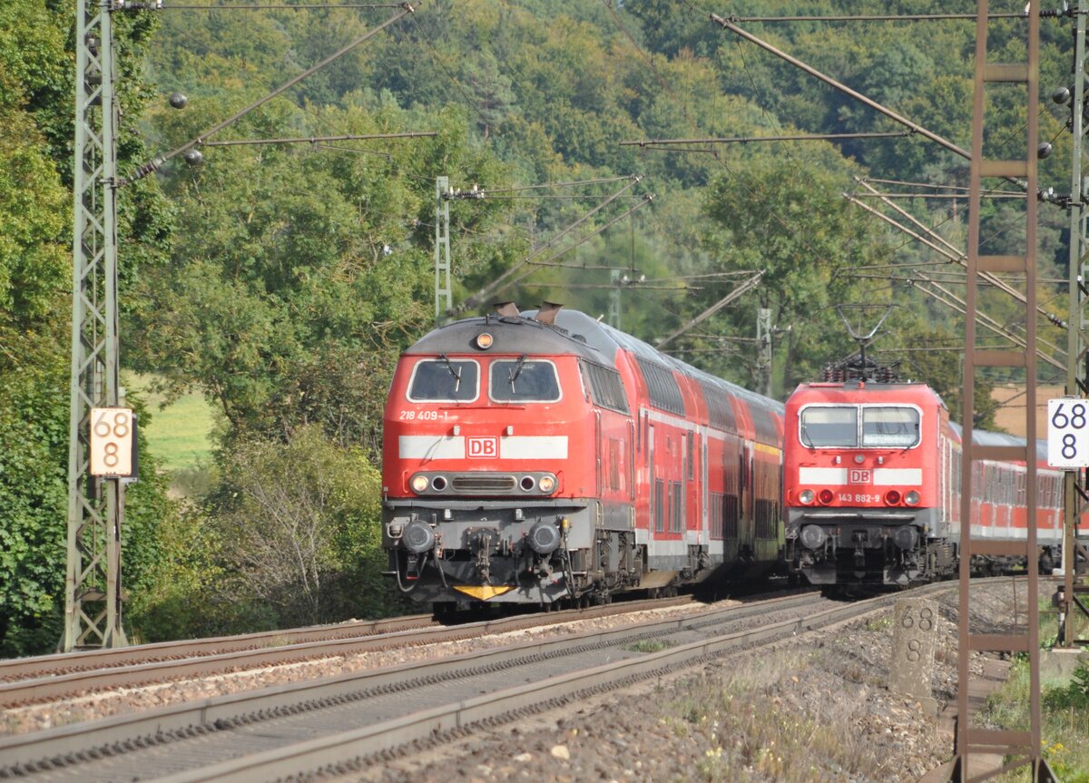 143 882-9 und 218 409-1 in Amstetten am 20.09.2012.