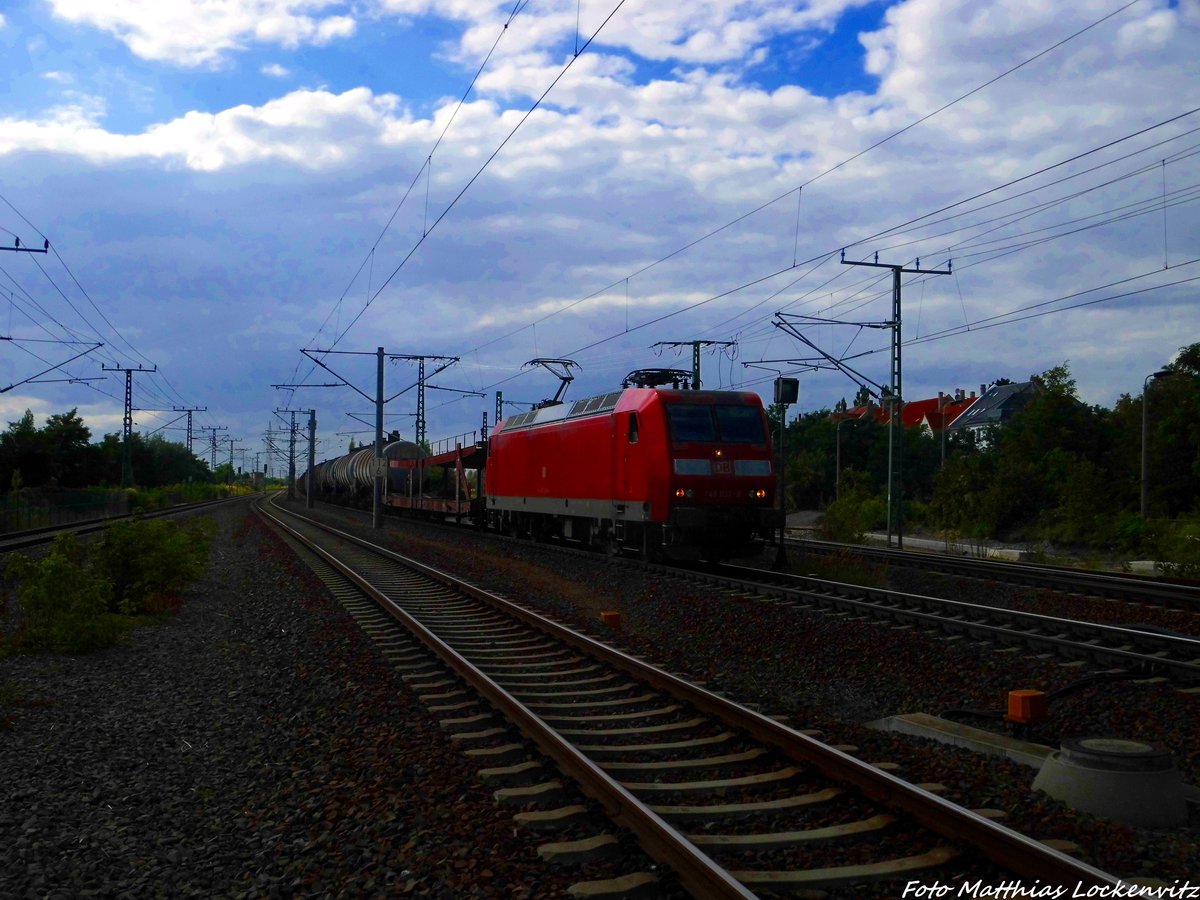 145 032 mit einem G�terzug bei der Durchfahrt am S-Bahnhof Leipzig-Wahren am 9.8.16