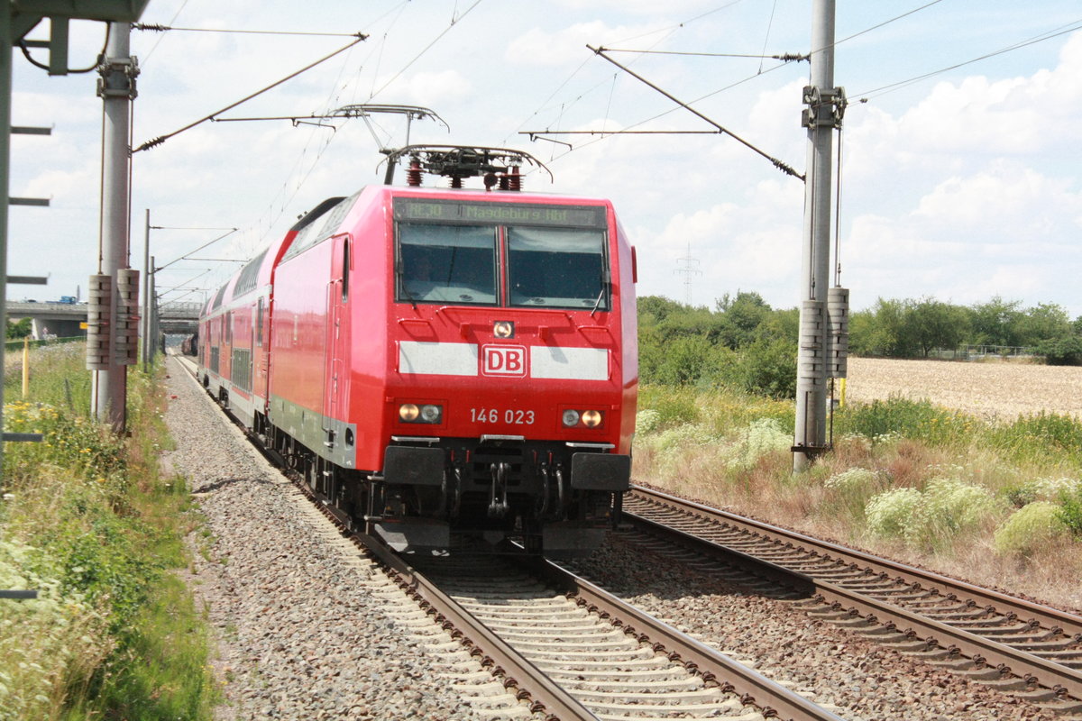 146 023 mit dem RE30 mit ziel Magdeburg Hbf bei der einfahrt in Z�beritz am 14.7.20