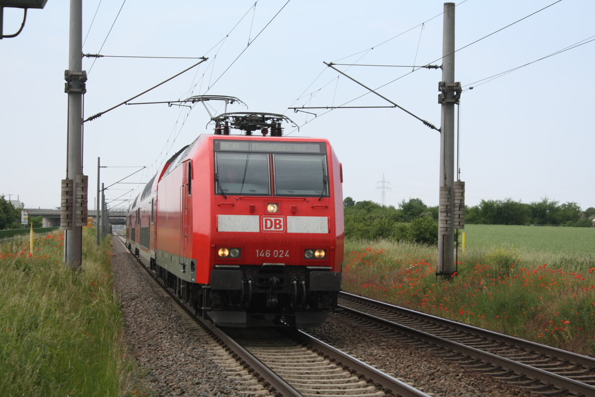 146 024 mit dem RE30 mit ziel Magdeburg Hbf bei der Einfahrt in Z�beritz am 9.6.21