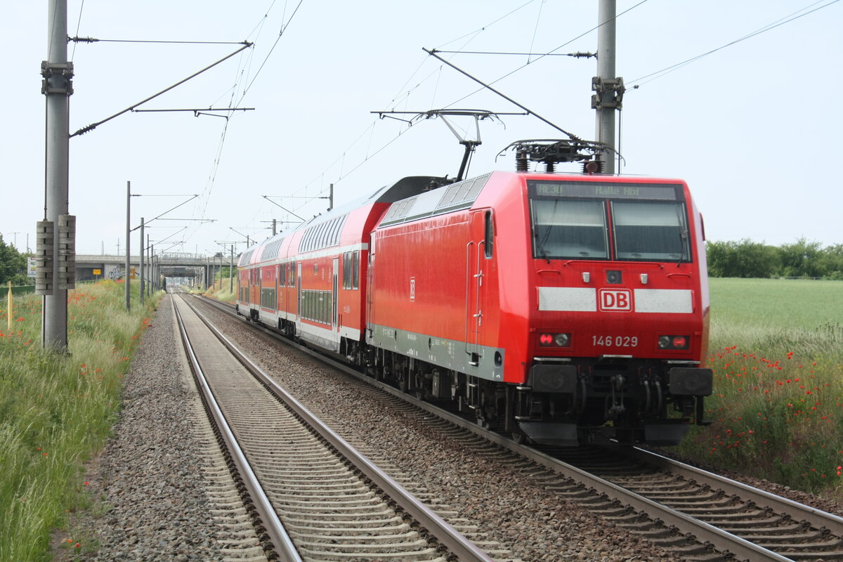 146 029 verl�sst als RE30 mit ziel Halle/Saale Hbf den Bahnhof Z�beritz am 9.6.21