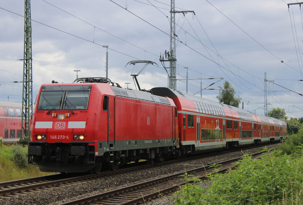 146 270-4 mit RE 4356 von Berlin Südkreuz nach Rostock Hbf bei der Einfahrt im Rostocker Hbf.04.08.2023