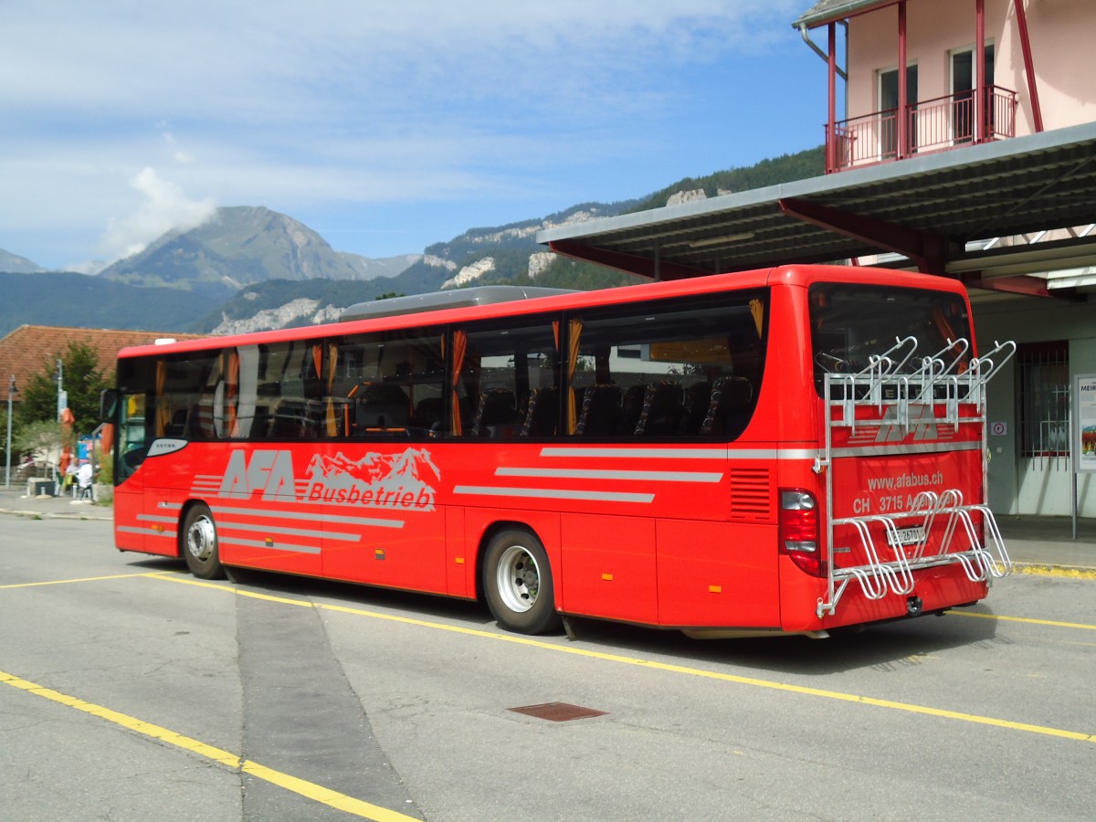 (147'001) - AFA Adelboden - Nr. 24/BE 26'701 - Setra am 2. September 2013 in Meiringen, Postautostation (Einsatz AVG M.)