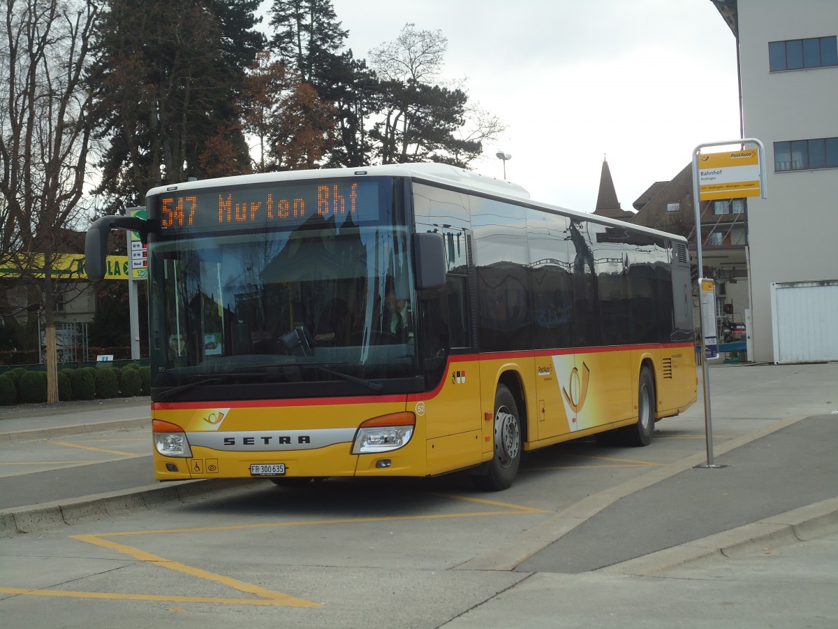 (148'168) - Wieland, Murten - Nr. 52/FR 300'635 - Setra am 25. November 2013 beim Bahnhof D�dingen