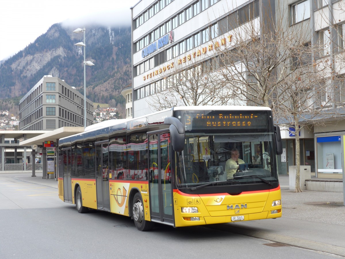 (149'153) - D�nser, Trimmis - GR 5865 - MAN am 1. M�rz 2014 beim Bahnhof Chur
