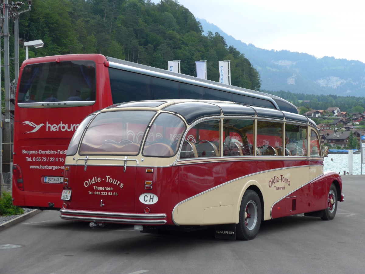 (151'562) - Reusser, Thun - BE 8484 - Saurer/R&J (ex H�sler, Menziken) am 15. Juni 2014 beim Bahnhof Brienz