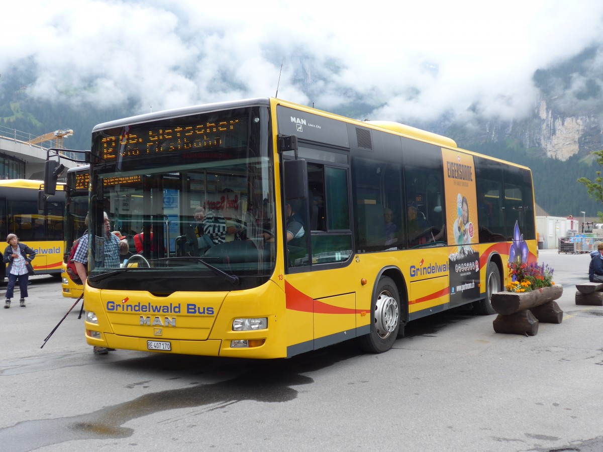 (153'550) - AVG Grindelwald - Nr. 13/BE 407'170 - MAN/G�ppel am 3. August 2014 beim Bahnhof Grindelwald