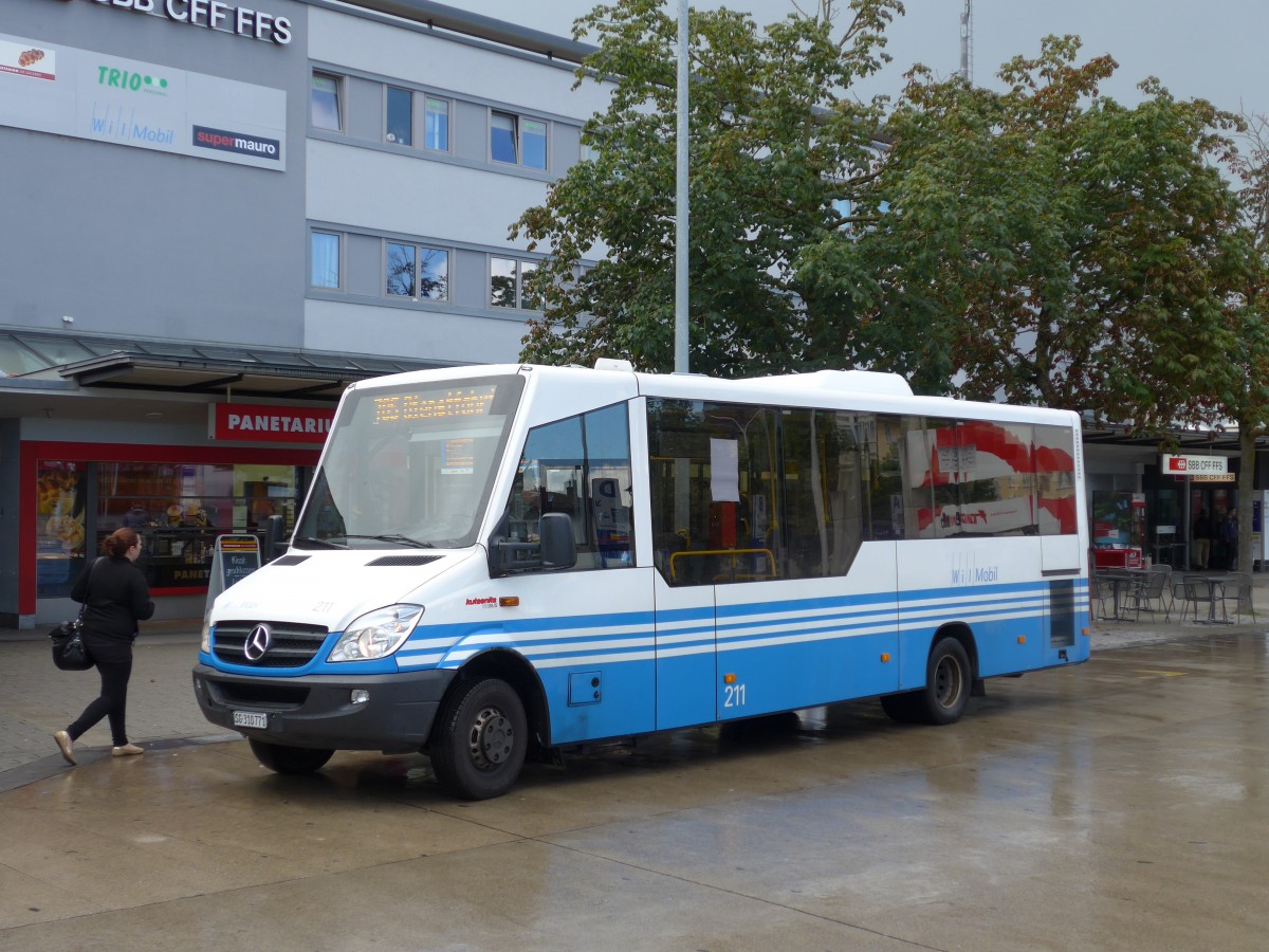 (153'913) - WilMobil, Wil - Nr. 211/SG 310'771 - Mercedes/Kutsenits am 16. August 2014 beim Bahnhof Wil