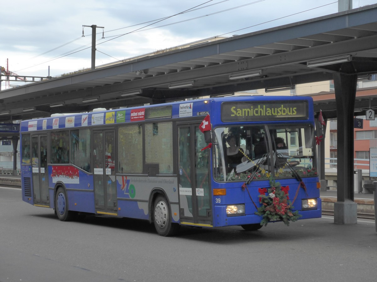 (157'767) - VZO Grningen - Nr. 39/ZH 242'853 - Mercedes (ex Schneider, Meilen Nr. 7) am 14. Dezember 2014 beim Bahnhof Uster