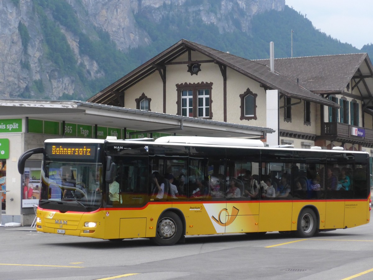 (162'004) - Dillier, Sarnen - Nr. 6/OW 10'003 - MAN am 8. Juni 2015 beim Bahnhof Meiringen