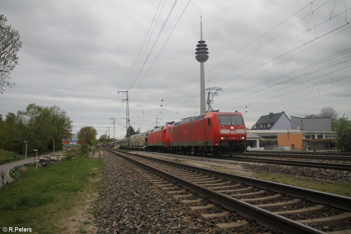 185 001-5 und 152 123-6 mit einem Autotransportzug in Nürnberg Hohe Marter. 09.04.24