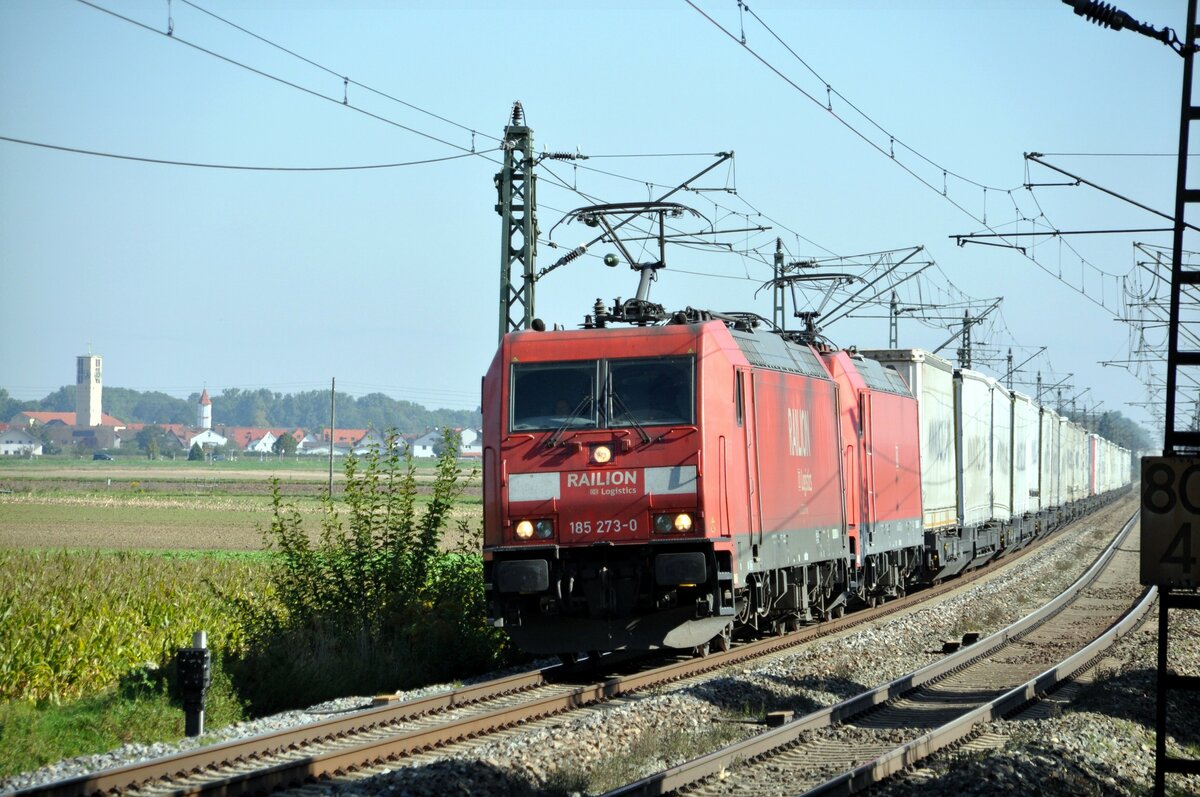 185 273-0 von Railion und eine weitere 185 mit Containerzug in Neu-Ulm Pfuhl am 03.10.2013.