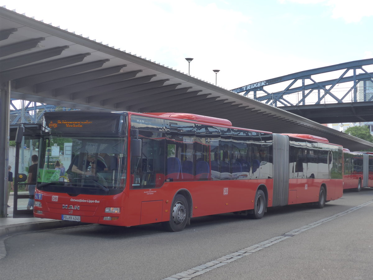 (194'188) - OLB M�nster - PB-HX 4348 - MAN am 18. Juni 2018 beim Bahnhof Freiburg