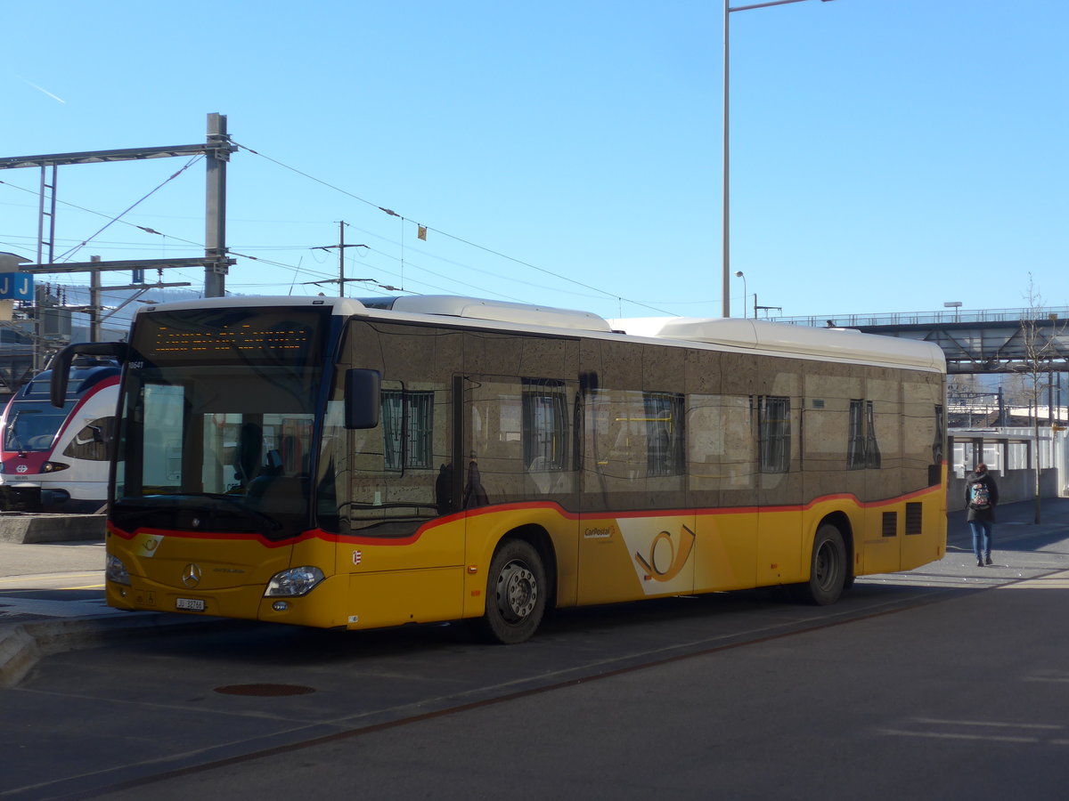 (201'581) - CarPostal Ouest - JU 32'766 - Mercedes (ex Nr. 26) am 16. Februar 2019 beim Bahnhof Del�mont