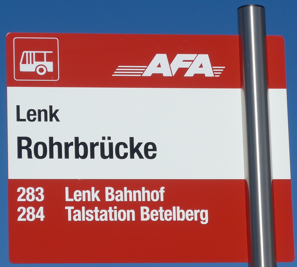 (201'677) - AFA-Haltestellenschild - Lenk, Rohrbr�cke - am 17. Februar 2019