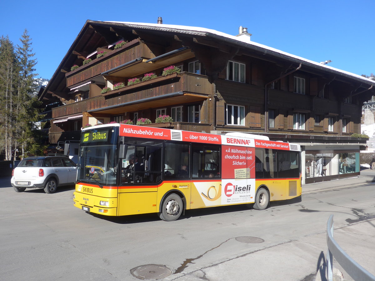 (201'692) - PostAuto Bern - BE 614'040 - MAN/G�ppel (ex AVG Meiringen Nr. 72) am 17. Februar 2019 beim Bahnhof Gstaad