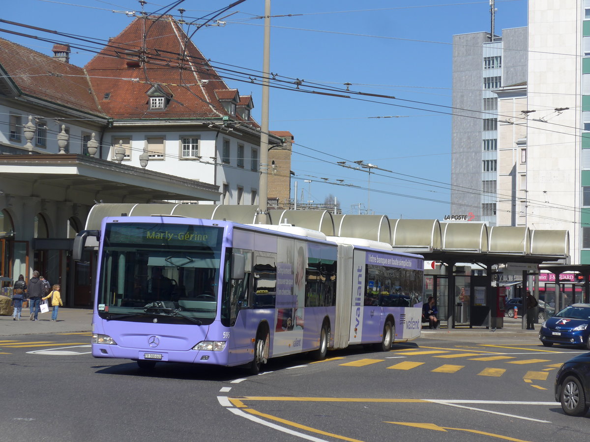 (203'252) - TPF Fribourg - Nr. 595/FR 300'440 - Mercedes am 24. M�rz 2019 beim Bahnhof Fribourg