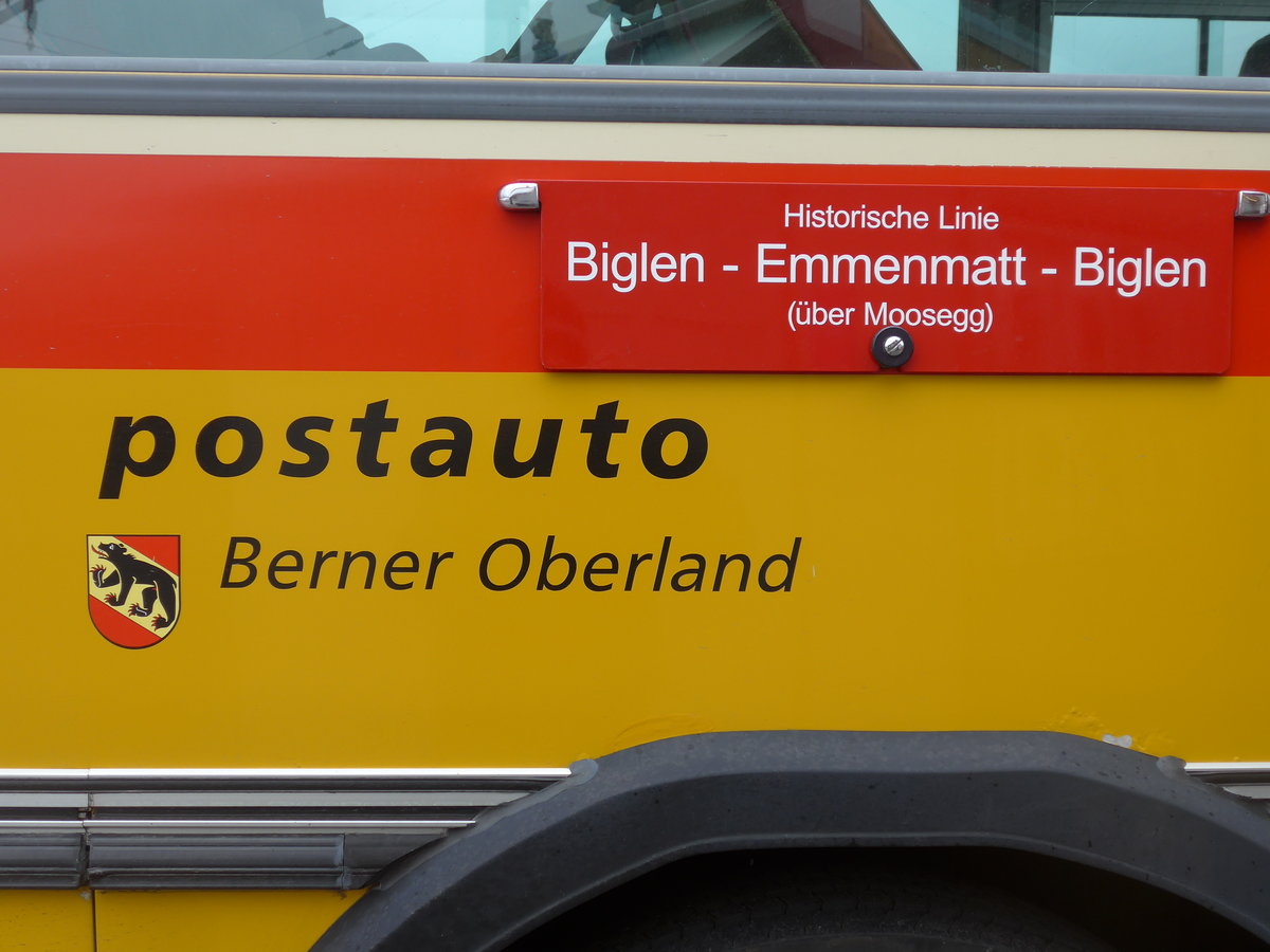 (203'490) - Krummenacher, Zillis - Nr. 74/BE 243'579 - Saurer/R&J (ex AVG Meiringen Nr. 74; ex PostAuto Berner Oberland; ex P 24'357) am 7. April 2019 beim Bahnhof Biglen (Detailaufnahme)
