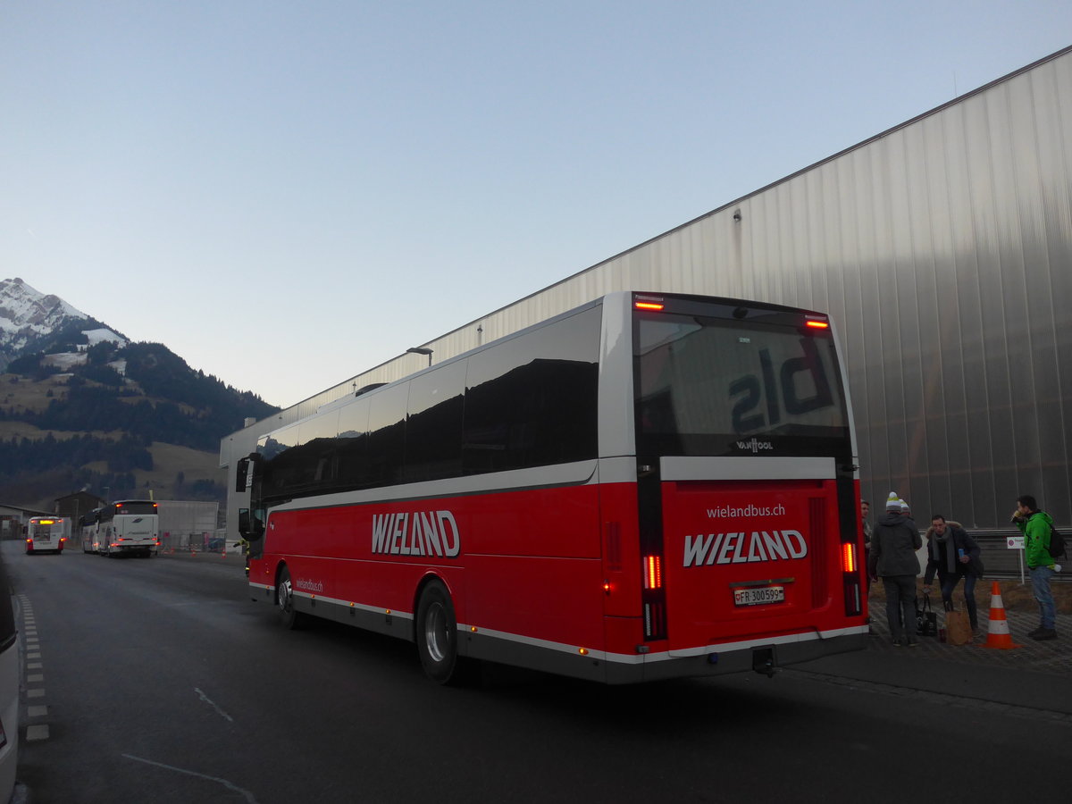 (213'464) - Wieland, Murten - Nr. 111/FR 300'599 - Van Hool am 11. Januar 2020 beim Bahnhof Frutigen