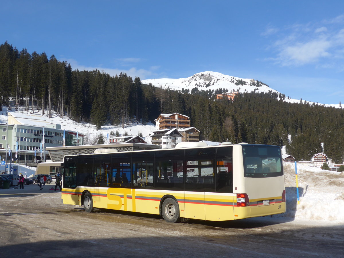 (223'235) - Pfosi, Arosa - Nr. 14/GR 112'438 - MAN (ex Regiobus, Gossau Nr. 37; ex STI Thun Nr. 124) am 2. Januar 2021 in Arosa, Post