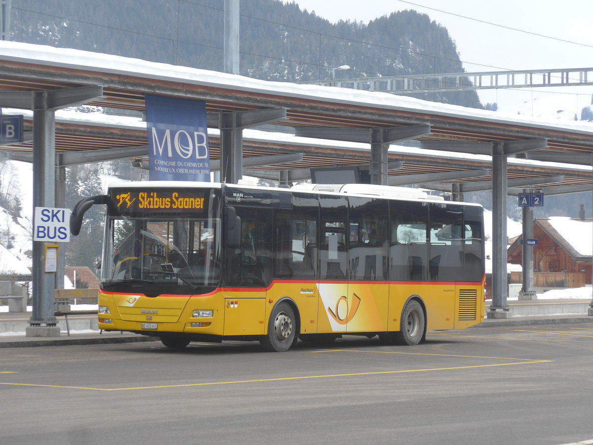 (223'445) - PostAuto Bern - BE 422'461 - MAN/G�ppel (ex AVG Meiringen Nr. 61) am 7. Februar 2021 beim Bahnhof Gstaad