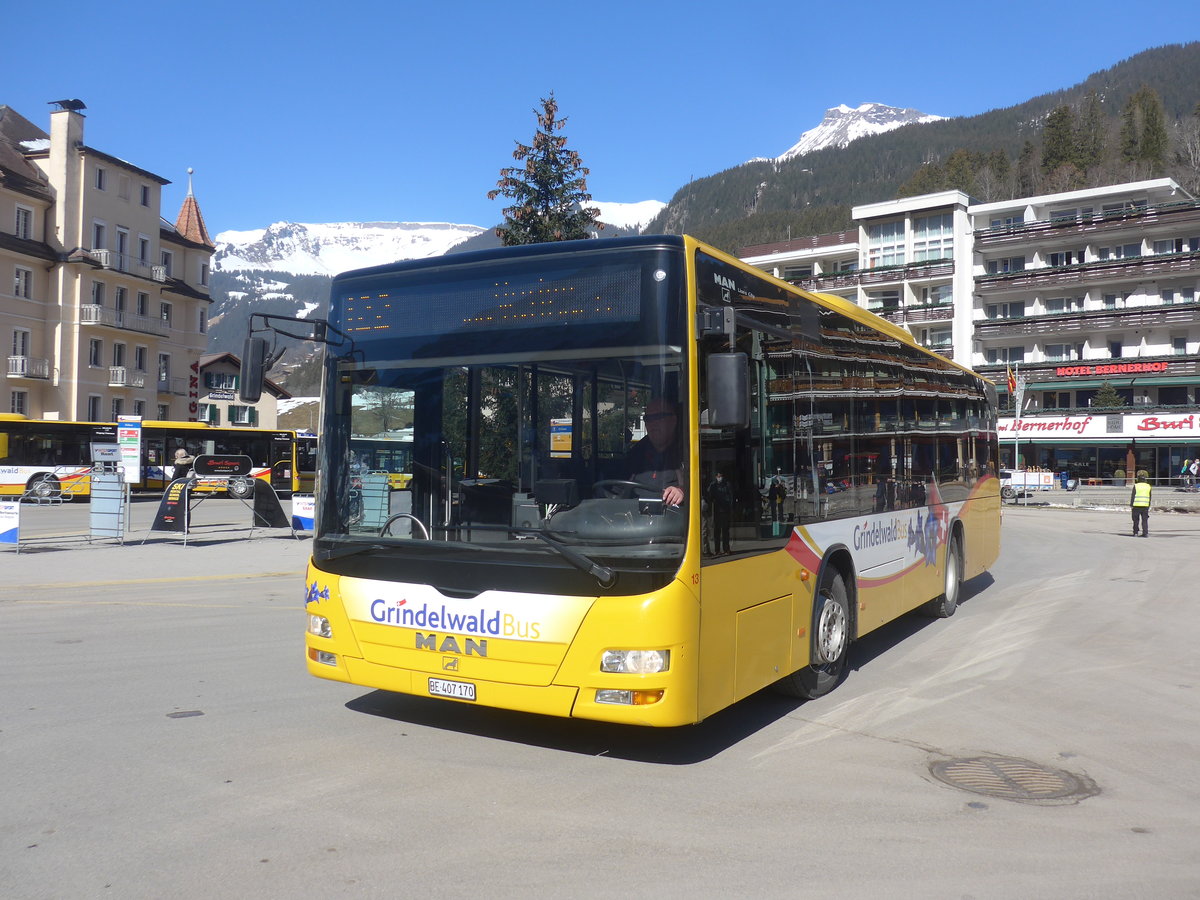 (223'847) - Grindelwaldbus, Grindelwald - Nr. 13/BE 407'170 - MAN/Gppel am 28. Februar 2021 beim Bahnhof Grindelwald