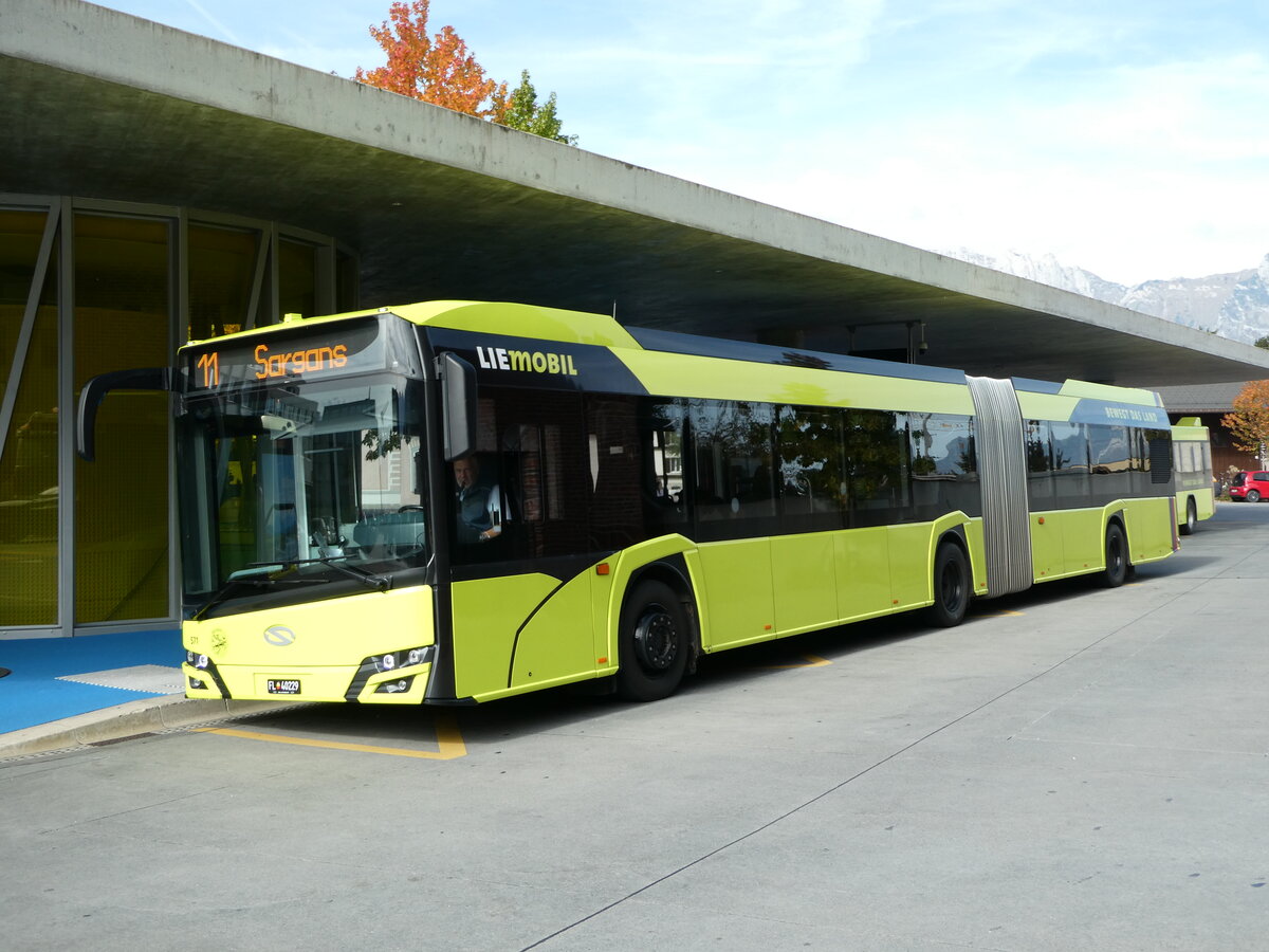 (240'936) - BOS PS Anstalt, Vaduz - Nr. 571/FL 40'229 - Solaris am 11. Oktober 2022 beim Bahnhof Schaan