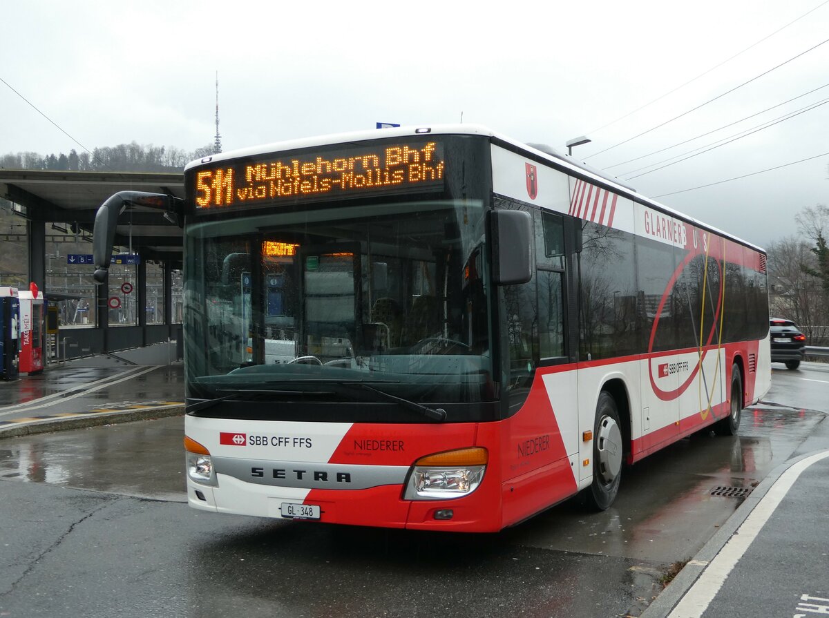 (244'409) - Niederer, Filzbach - Nr. 26/GL 348/PID 10'053 - Setra am 3. Januar 2023 beim Bahnhof Ziegelbr�cke