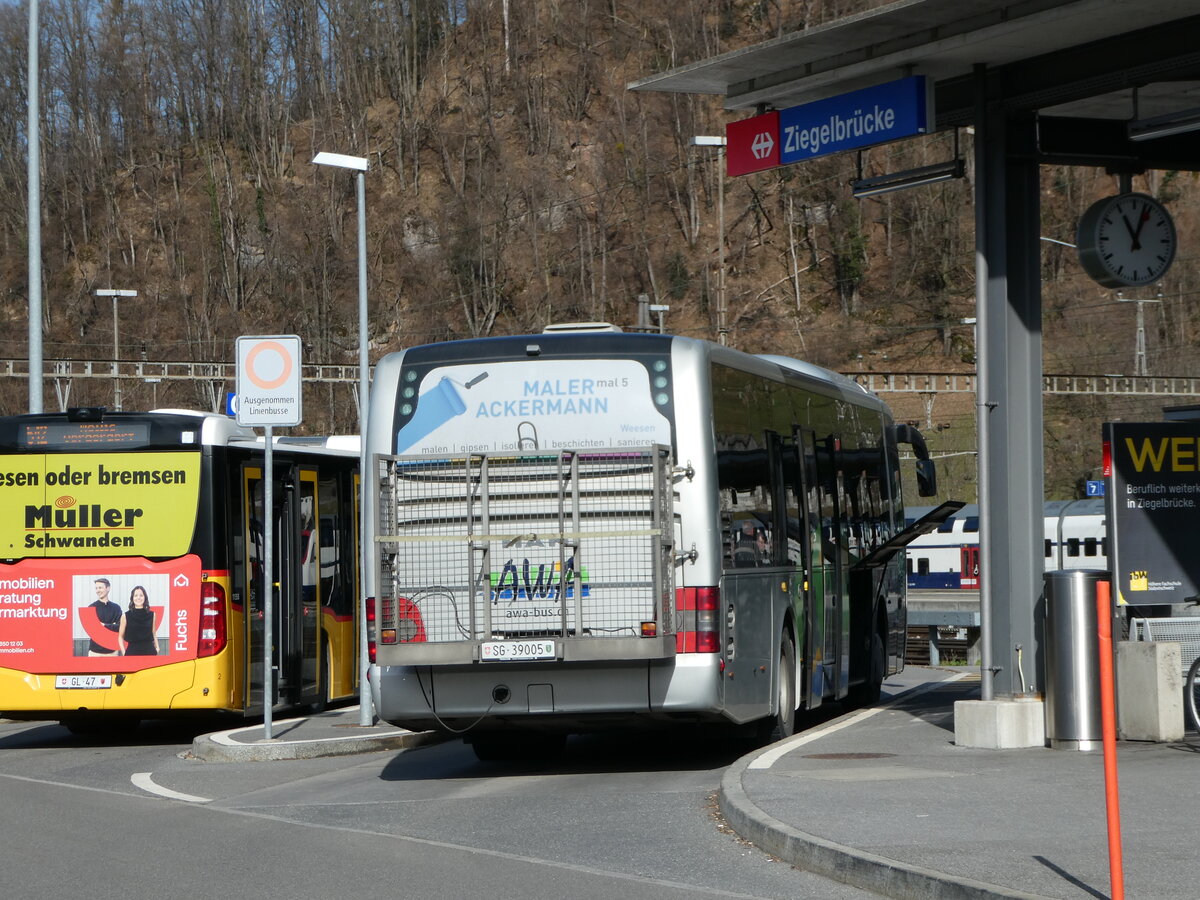 (246'470) - AWA Amden - Nr. 5/SG 39'005 - MAN (ex ATT Cadenazzo; ex St. Gallerbus, St. Gallen; ex Vorfhrfahrzeug) am 24. Februar 2023 beim Bahnhof Ziegelbrcke