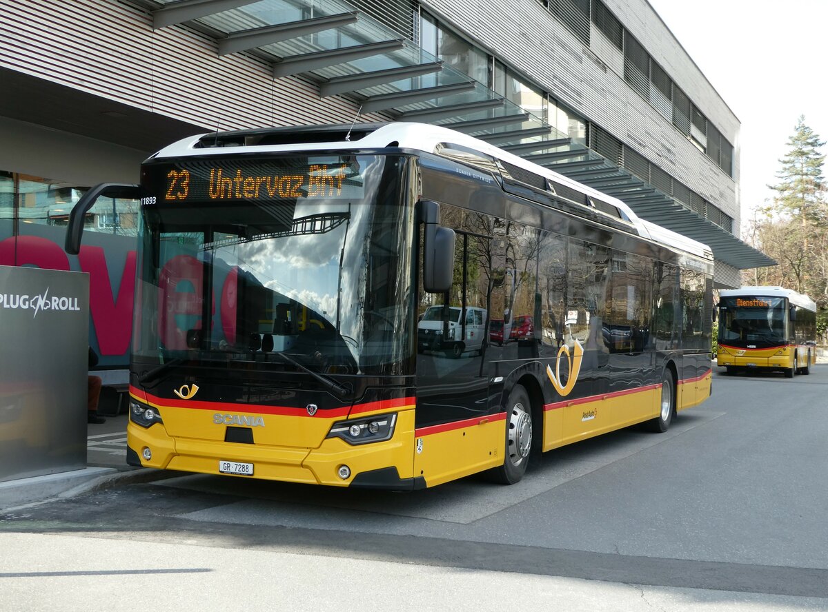 (246'536) - Dünser, Trimmis - GR 7288/PID 11'893 - Scania (ex GR 165'792) am 24. Februar 2023 beim Bahnhof Landquart