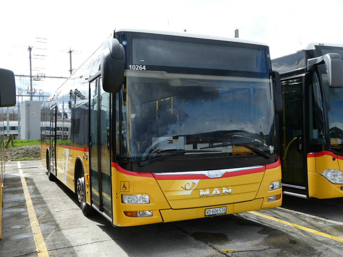 (247'650) - CarPostal Ouest - VD 606'576/PID 10'264 - MAN (ex TSPG Saignel�gier) am 25. M�rz 2023 in Yverdon, Garage