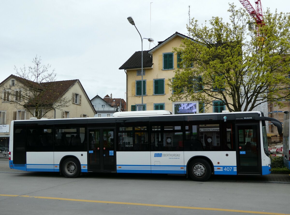 (248'513) - BOTG Amriswil - Nr. 407/TG 126'214 - MAN (ex Nr. 4) am 13. April 2023 beim Bahnhof Amriswil