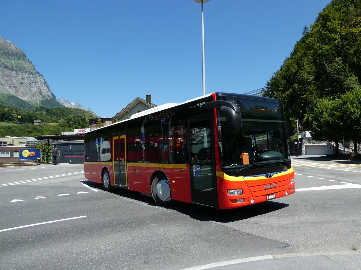 (252'709) - AS Engi - Nr. 10/GL 7710 - MAN am 15. Juli 2023 beim Bahnhof Schwanden