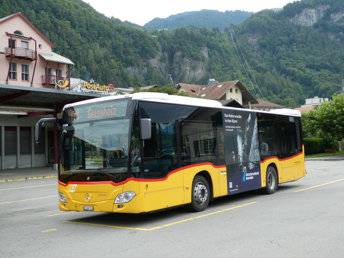 (253'118) - Fl�ck, Brienz - Nr. 23/BE 868'723/PID 11'528 - Mercedes am 29. Juli 2023 in Meiringen, Postautostation