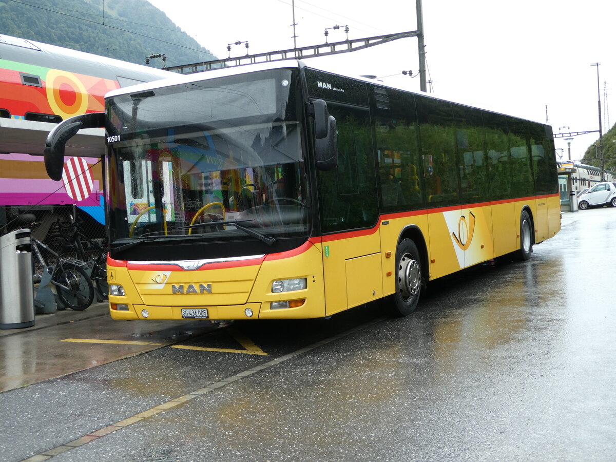 (255'410) - PostAuto Ostschweiz - SG 436'005/PID 10'501 - MAN am 18. September 2023 beim Bahnhof Ziegelbr�cke