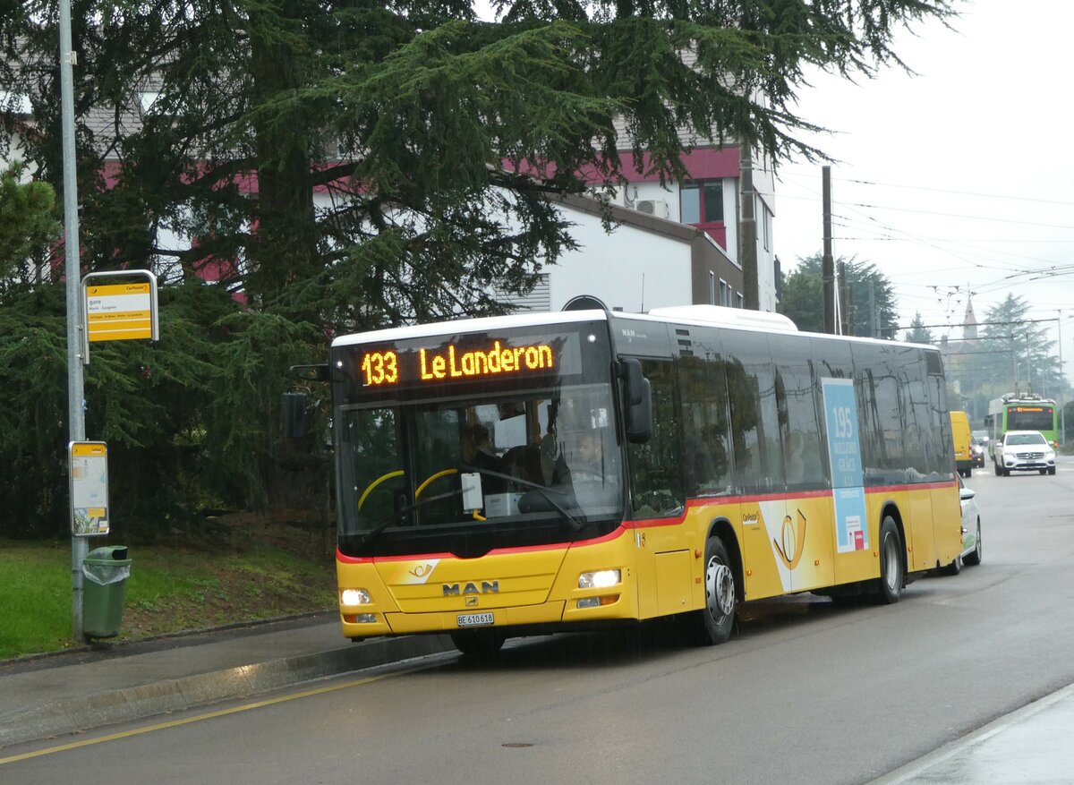 (256'169) - Funi-Car, Biel - Nr. 18/BE 610'618/PID 5709 - MAN am 19. Oktober 2023 beim Bahnhof Marin-pagnier