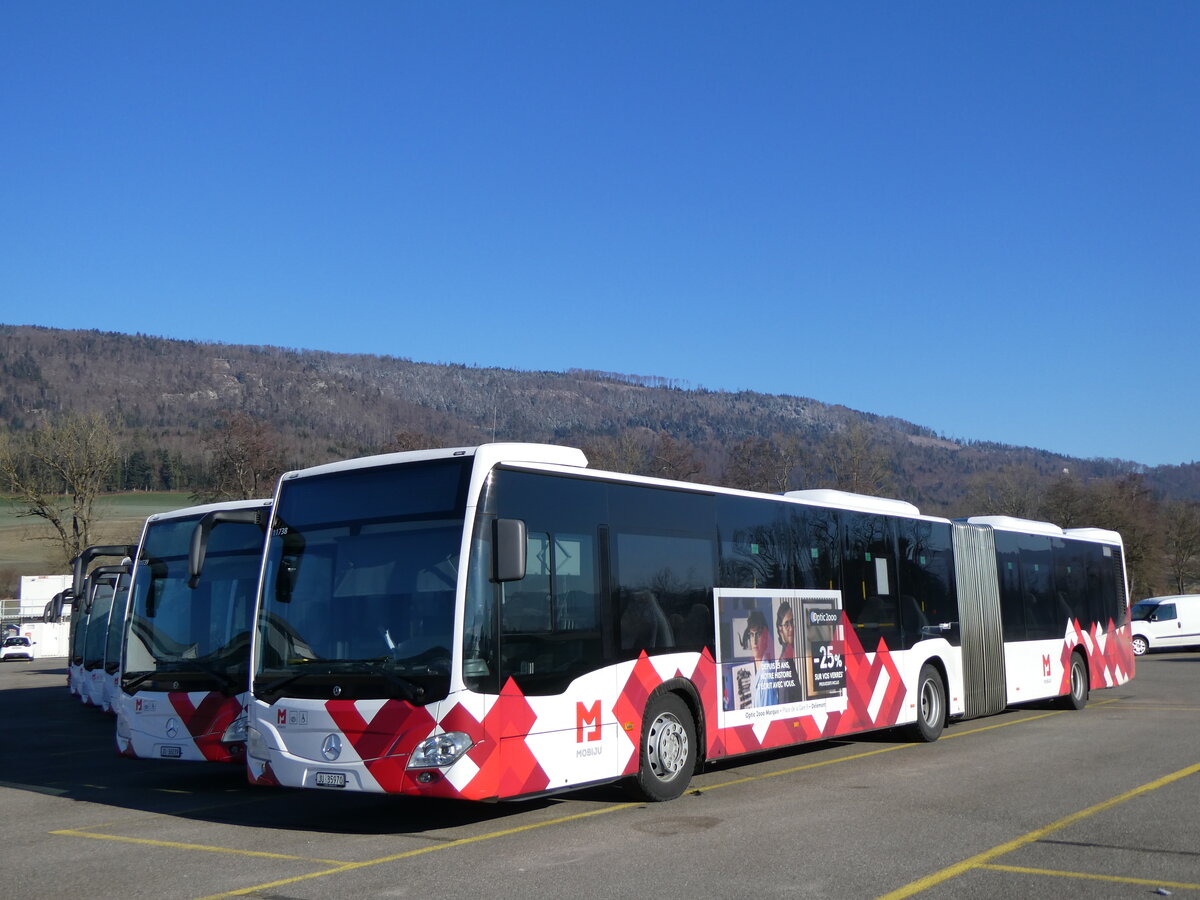 (258'762) - CarPostal Ouest - JU 35'970/PID 11'738 - Mercedes am 20. Januar 2024 in Develier, Parkplatz