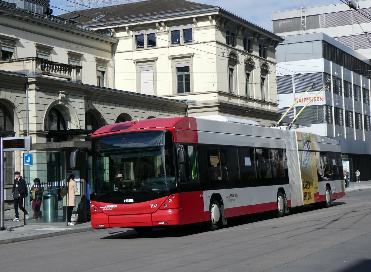 (259'575) - SW Winterthur - Nr. 102 - Hess/Hess Gelenktrolleybus am 24. Februar 2024 beim Hauptbahnhof Winterthur