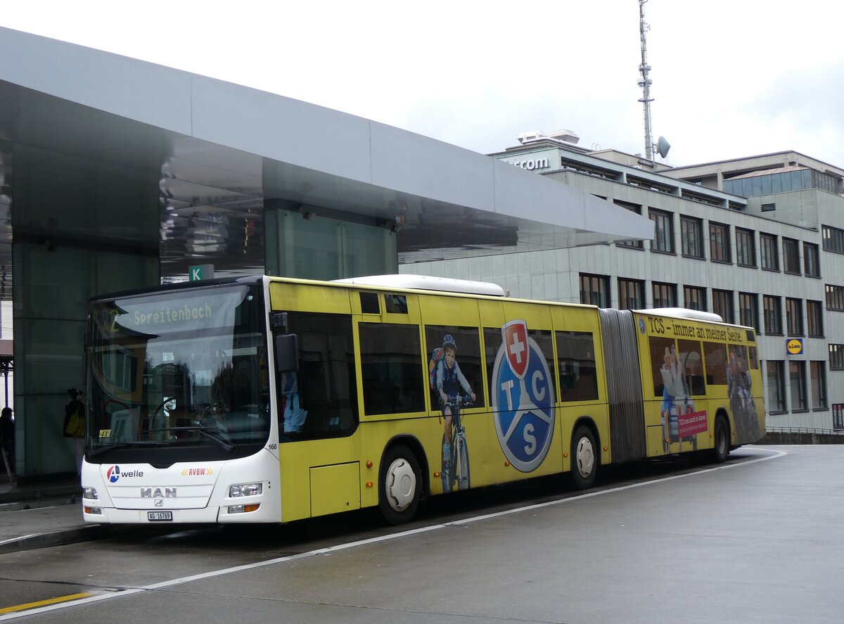 (260'730) - RVBW Wettingen - Nr. 168/AG 16'769 - MAN am 28. Mrz 2024 beim Bahnhof Baden 