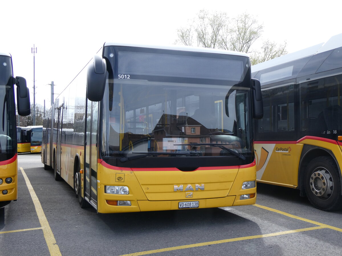 (260'828) - CarPostal Ouest - VD 608'138/PID 5012 - MAN (ex NE 165'376; ex VD 495'042) am 29. Mrz 2024 in Yverdon, Garage