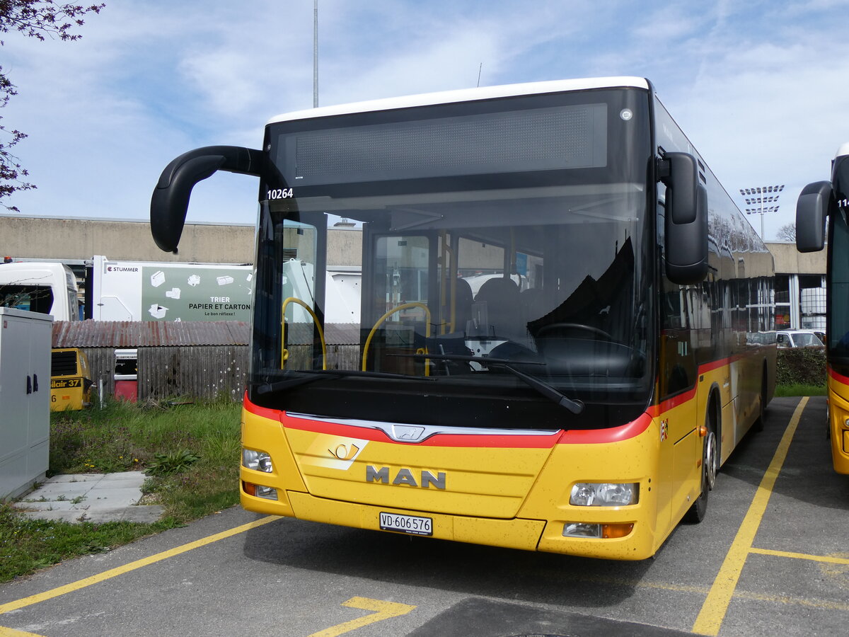 (260'843) - CarPostal Ouest - VD 606'576/PID 10'264 - MAN (ex TSPG Saignel�gier) am 29. M�rz 2024 in Yverdon, Garage