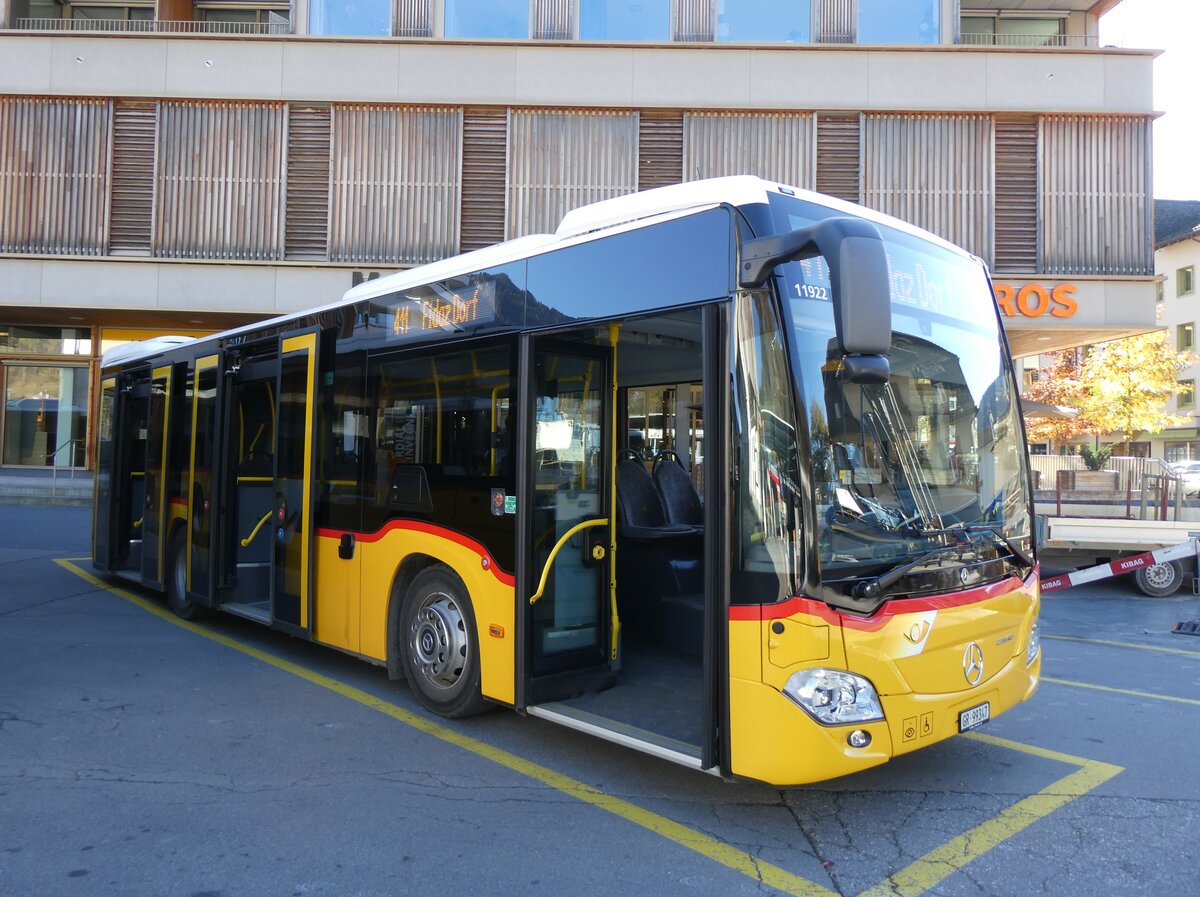 (268'840) - PostAuto Graub�nden - GR 99'347/PID 11'922 - Mercedes am 29. Oktober 2024 beim Bahnhof Ilanz