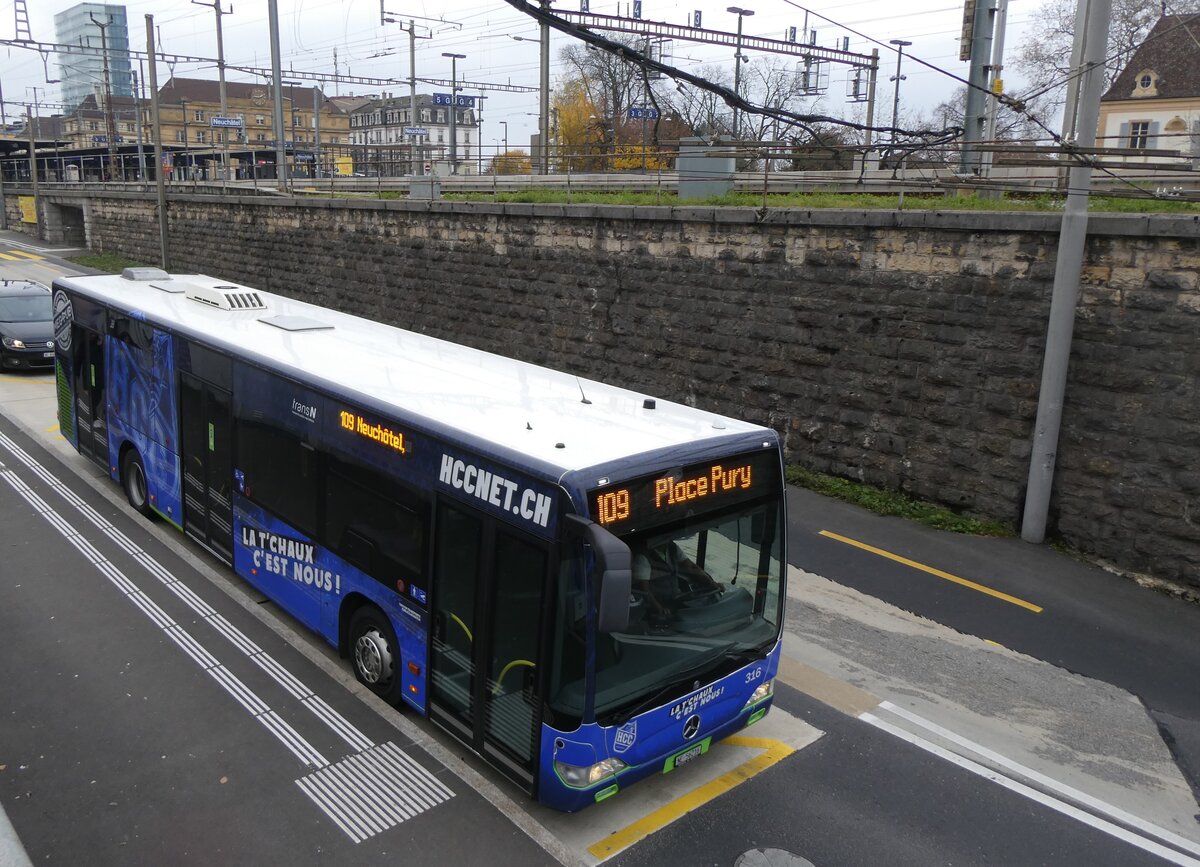 (269'530) - transN, La Chaux-de-Fonds - Nr. 316/NE 56'216 - Mercedes (ex TRN La Chaux-de-Fonds Nr. 316) am 30. November 2024 beim Bahnhof Neuch�tel