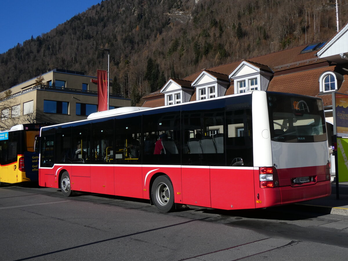 (269'893) - PostAuto Bern - BE 403'166/PID 12'336 - MAN (ex Dr. Richard, A-Wien Nr. 1411) am 16. Dezember 2024 beim Bahnhof Interlaken Ost