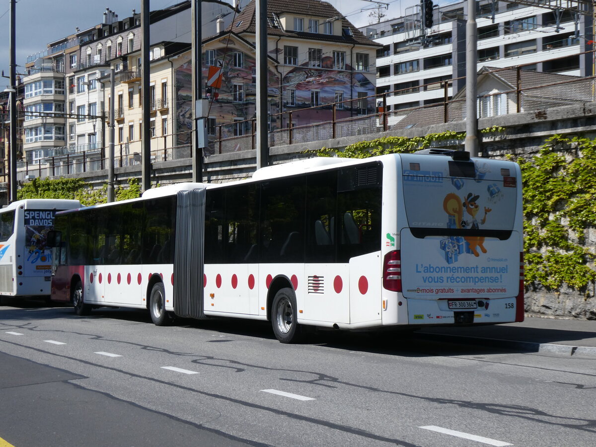 (274'271) - TPF Fribourg - Nr. 158/FR 300'364 - Mercedes am 26. April 2025 beim Bahnhof Neuch�tel
