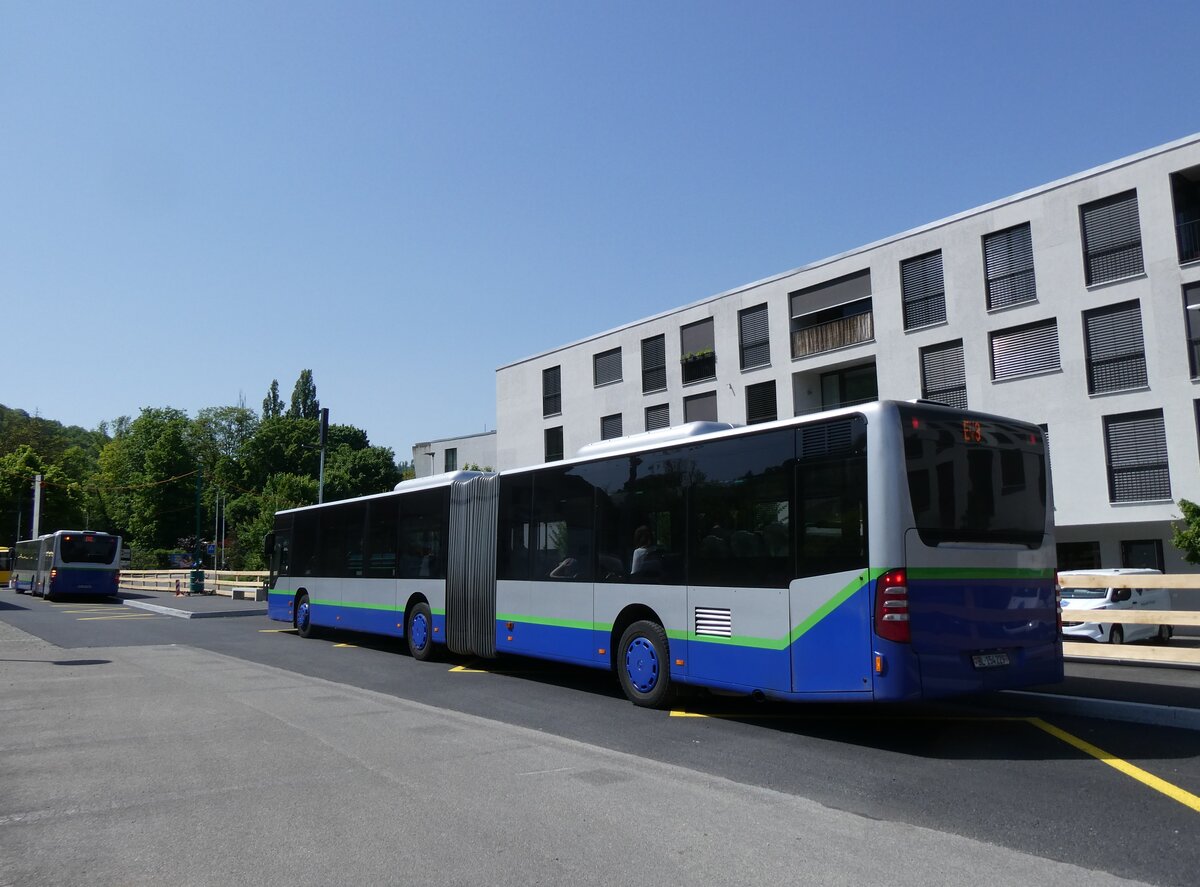(274'448) - PostAuto Nordschweiz - BL 154'229/PID 12'420 - Mercedes (ex TPL Lugano Nr. 404) am 2. Mai 2025 beim Bahnhof Aesch