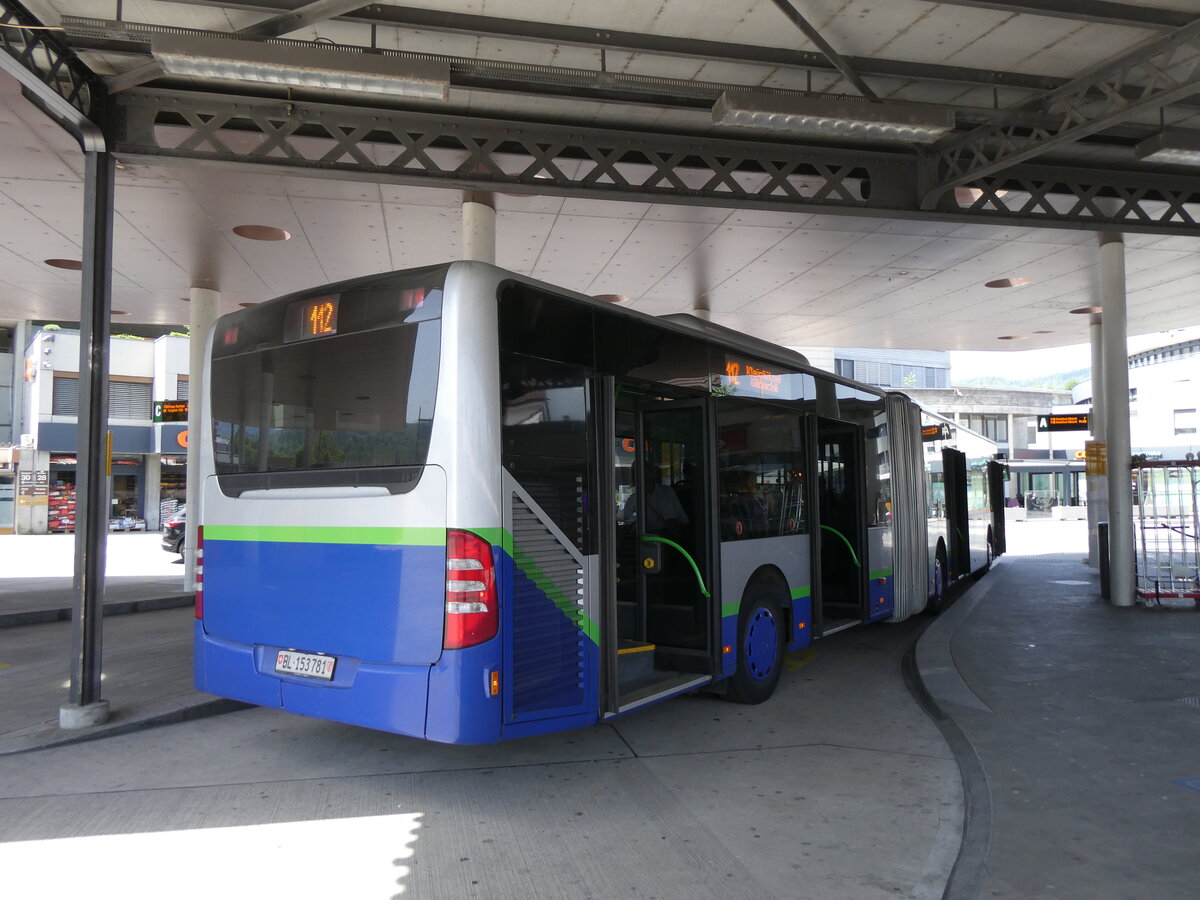 (274'470) - PostAuto Nordschweiz - BL 153'781/PID 12'422 - Mercedes (ex TPL Lugano Nr. 406) am 2. Mai 2025 beim Bahnhof Laufen