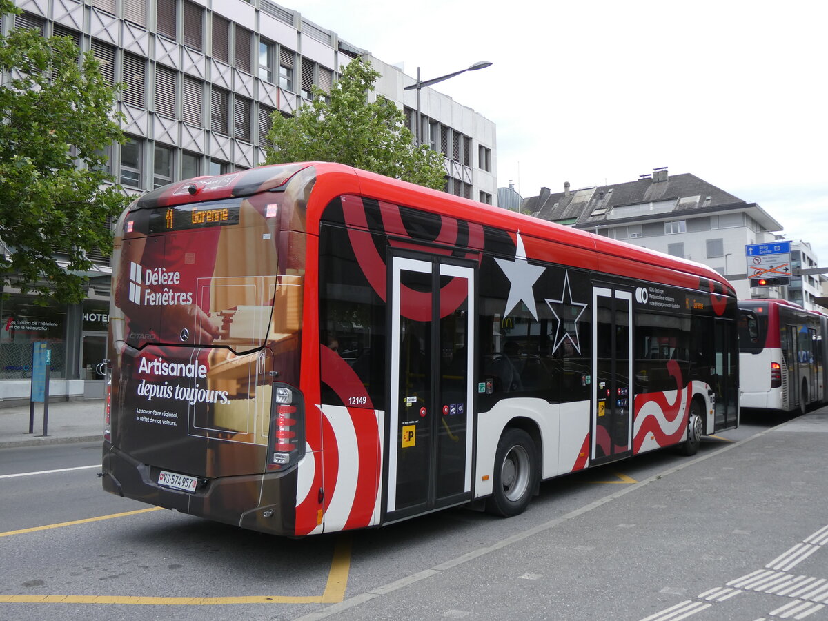 (276'322) - PostAuto Wallis - VS 574'957/PID 12'149 - eMercedes am 6. Juni 2025 beim Bahnhof Sion