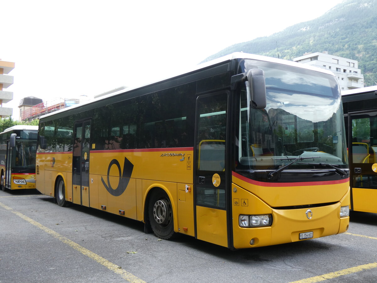 (276'717) - PostAuto Wallis - VS 354'601/PID 5053 - Irisbus am 14. Juni 2025 in Brig, Garage