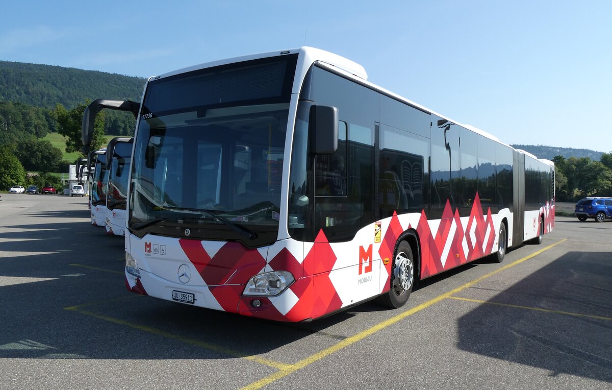 (278'687) - CarPostal Ouest - JU 35'911/PID 11'736 - Mercedes am 9. August 2025 in Develier, Parkplatz